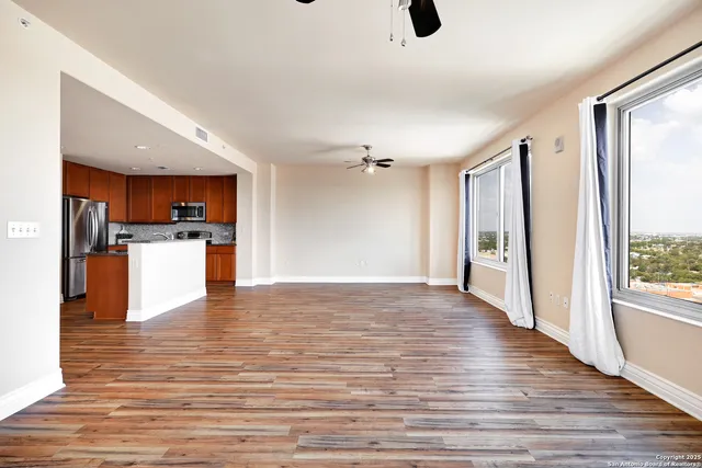 a view of kitchen with wooden floor