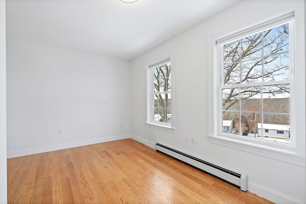 16 Hodgkins Road, Unit 2 Rockport, MA 01966 - Photo 13 of 19 a view of an empty room and window