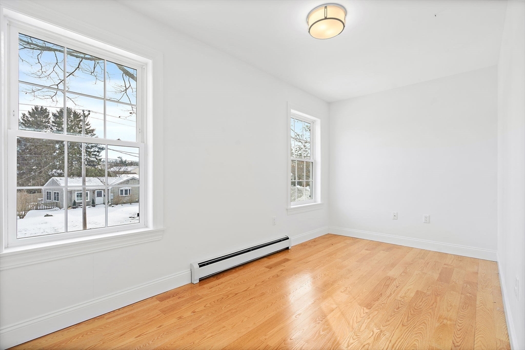 16 Hodgkins Road, Unit 2 Rockport, MA 01966 - Photo 15 of 19 an empty room with windows