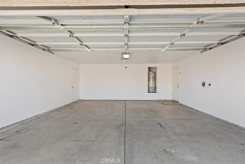 12278 Shadow Drive Victorville, CA 92392 - Photo 26 of 32 a view of a garage
