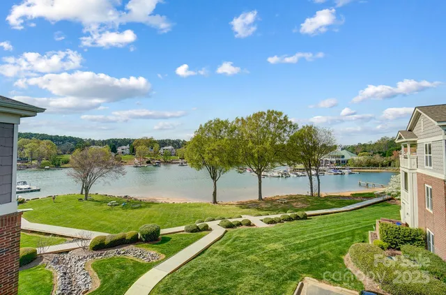 a view of a lake with a big yard