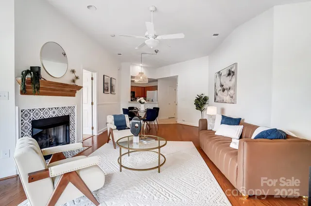 a view of a hallway with paintings on the wall