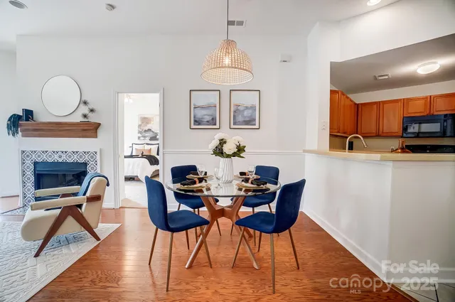 a kitchen with stainless steel appliances granite countertop a sink stove and microwave