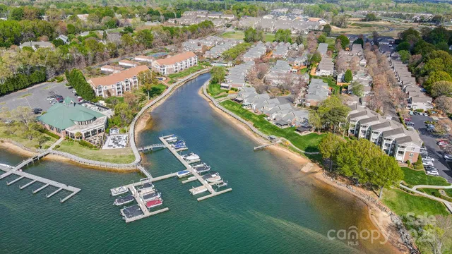 an aerial view of house with yard