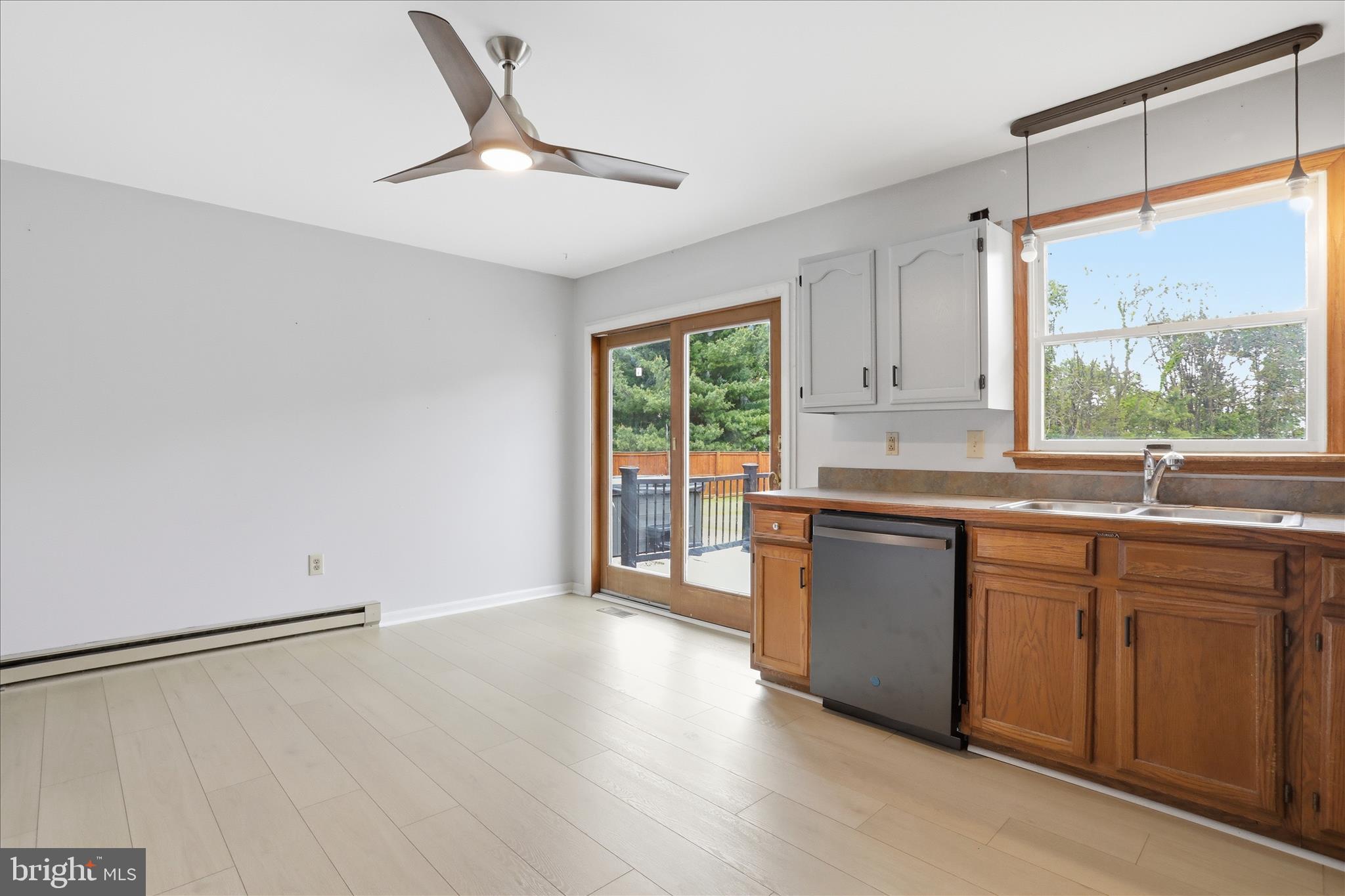 13733 Barnhart Road Clear Spring, MD 21722 - Photo 18 of 32 a kitchen with a large window appliances and cabinets