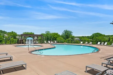 a picture of a cabinet with a white wall and white walls