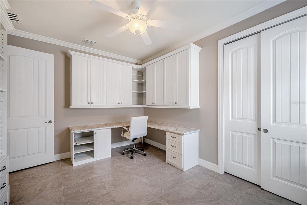 9550 Southwest 64th Lane Ocala, FL 34481 - Photo 27 of 58 a view of a workspace with furniture and a window