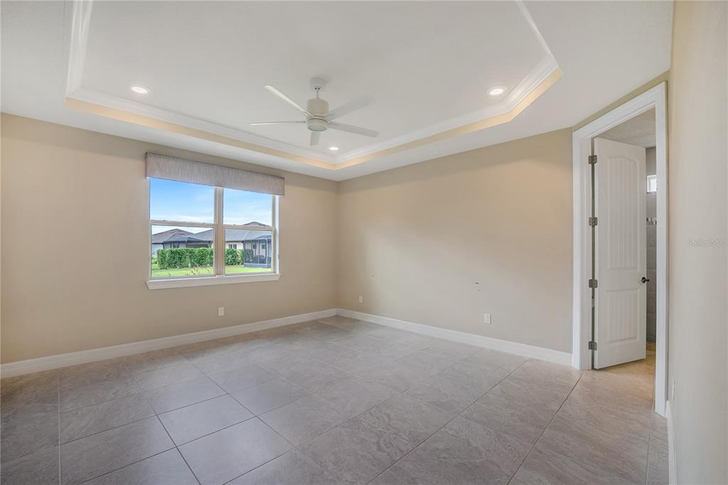 9550 Southwest 64th Lane Ocala, FL 34481 - Photo 32 of 58 an empty room with windows and closet