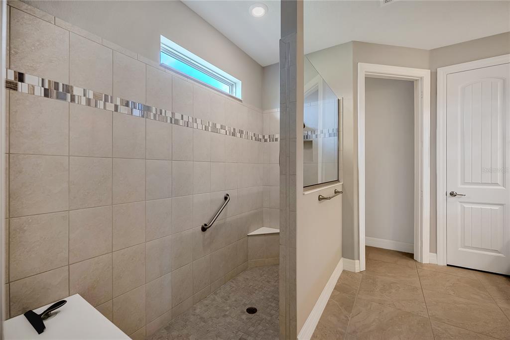 9550 Southwest 64th Lane Ocala, FL 34481 - Photo 39 of 58 a bathroom with a shower