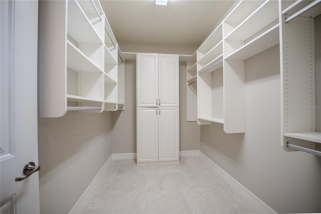 9550 Southwest 64th Lane Ocala, FL 34481 - Photo 42 of 58 an empty walk in closet