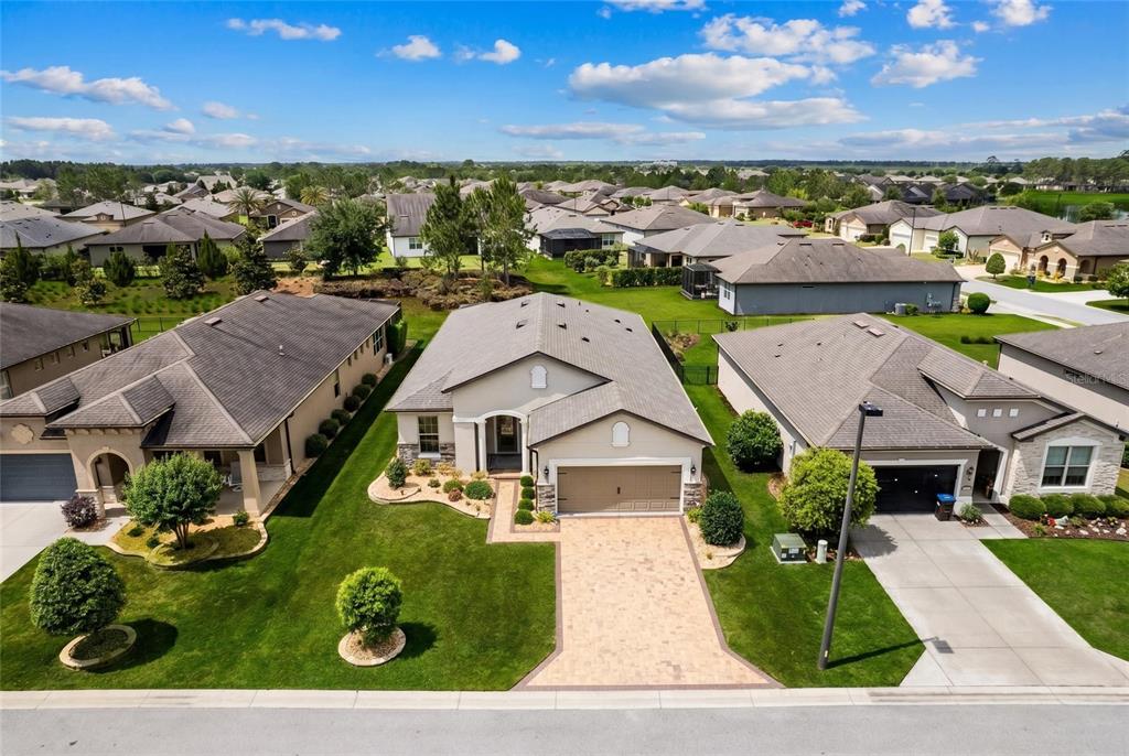 9550 Southwest 64th Lane Ocala, FL 34481 - Photo 55 of 58 an aerial view of residential houses with outdoor space