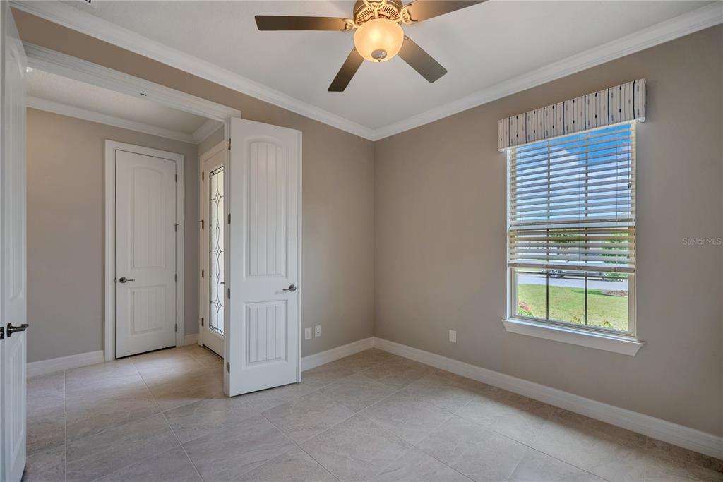 9550 Southwest 64th Lane Ocala, FL 34481 - Photo 6 of 58 a view of an empty room with a window