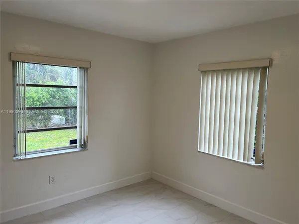 an empty room with a window