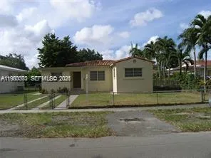 a view of backyard of house