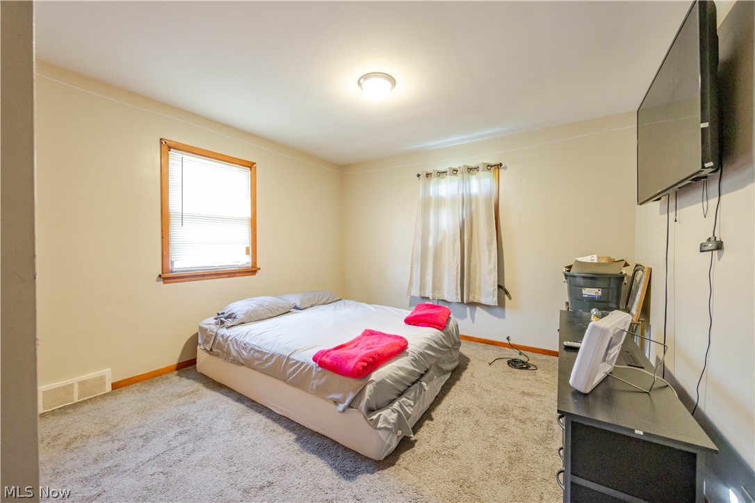 3825 Mayfield Road Cleveland Heights, OH 44121 - Photo 14 of 27 Carpeted room with neutral wall paint and white trim