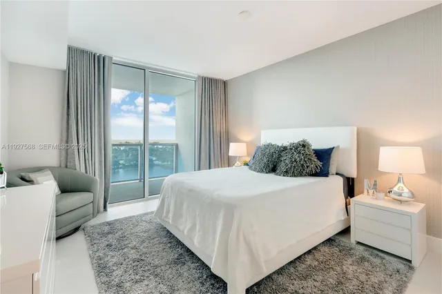 a bed room with a bed and a couch