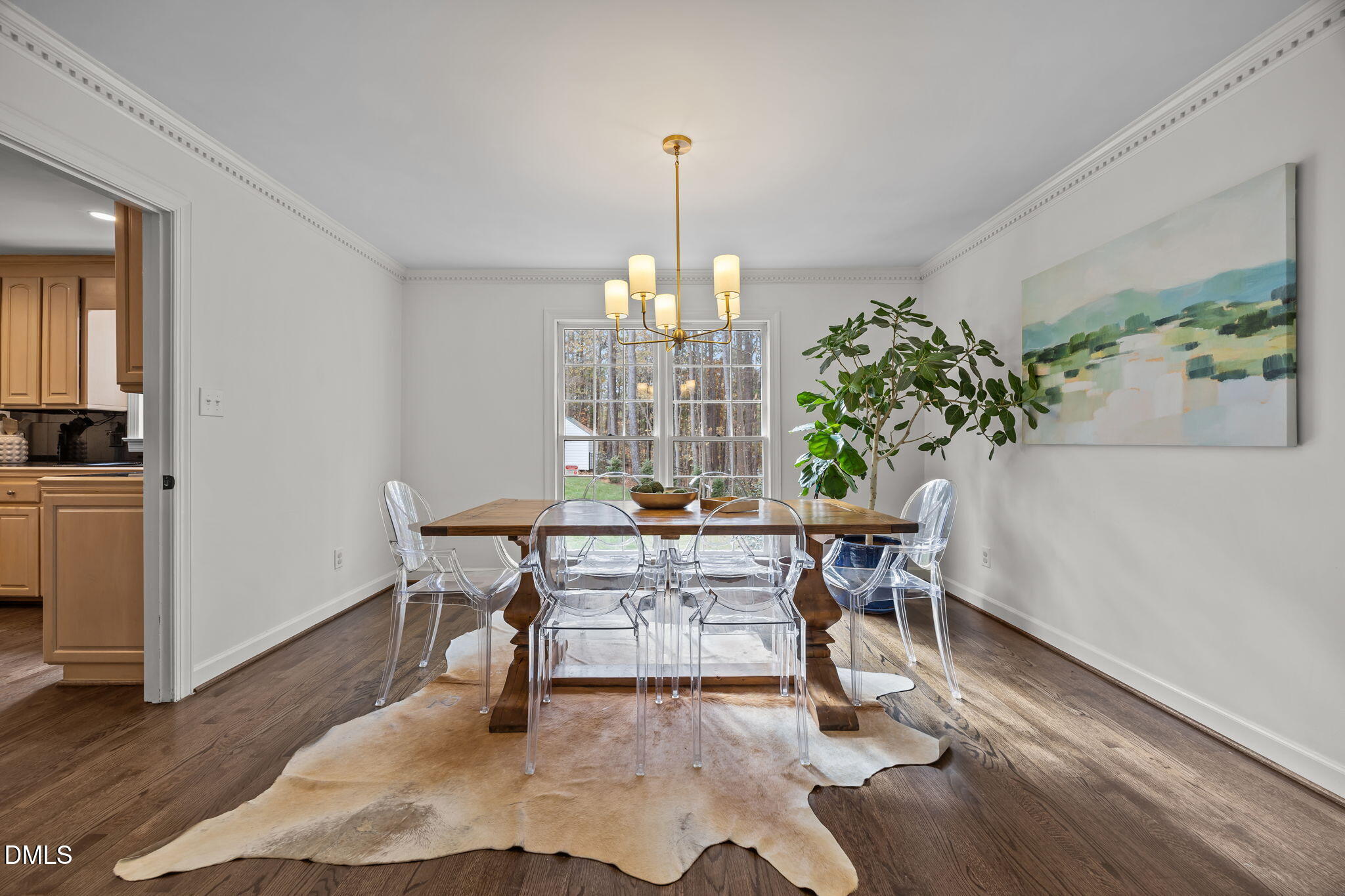 1120 Queensferry Road Cary, NC 27511 - Photo 11 of 62 a view of a dining room with furniture window and wooden floor