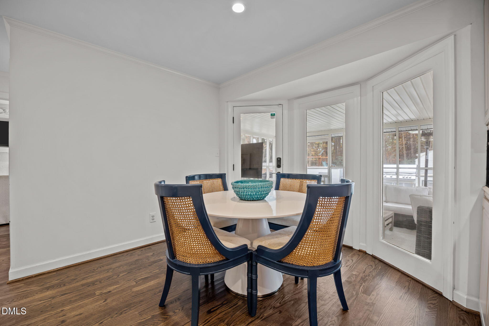 1120 Queensferry Road Cary, NC 27511 - Photo 19 of 62 a view of a dining room with furniture and wooden floor