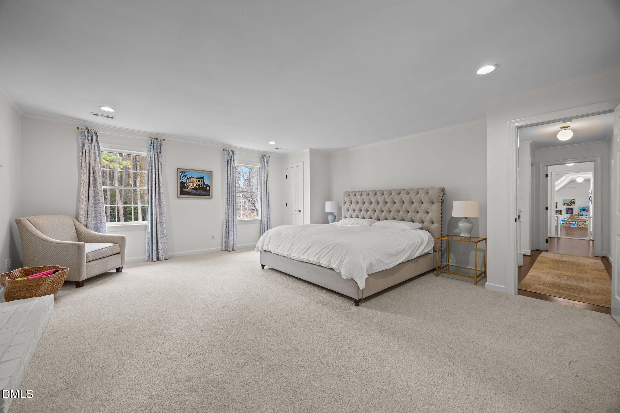 1120 Queensferry Road Cary, NC 27511 - Photo 25 of 62 a spacious bedroom with a bed and glass window