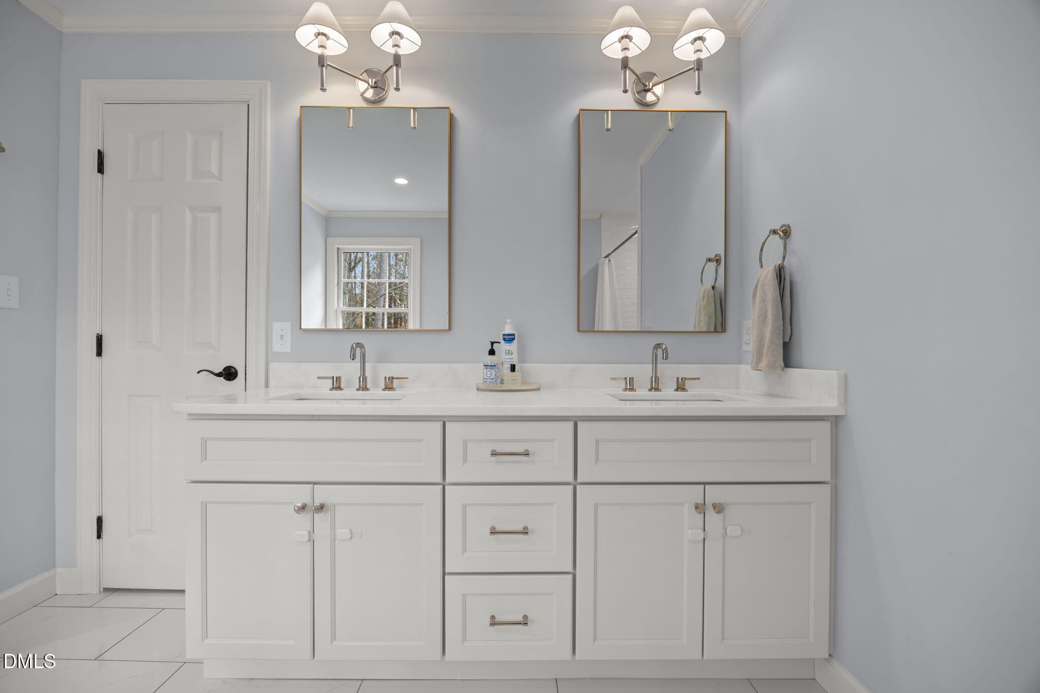 1120 Queensferry Road Cary, NC 27511 - Photo 31 of 62 a bathroom with white cabinets and sink