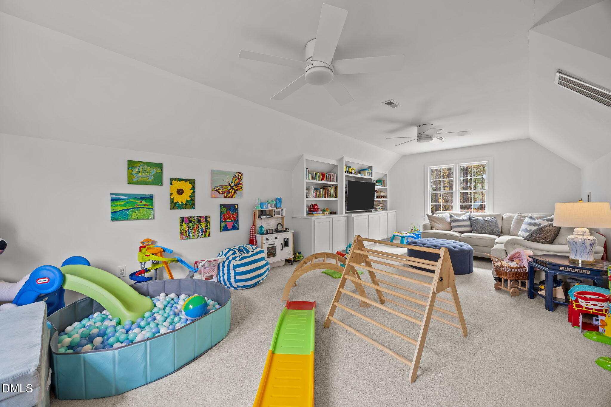 1120 Queensferry Road Cary, NC 27511 - Photo 42 of 62 a living room filled with furniture and a couch