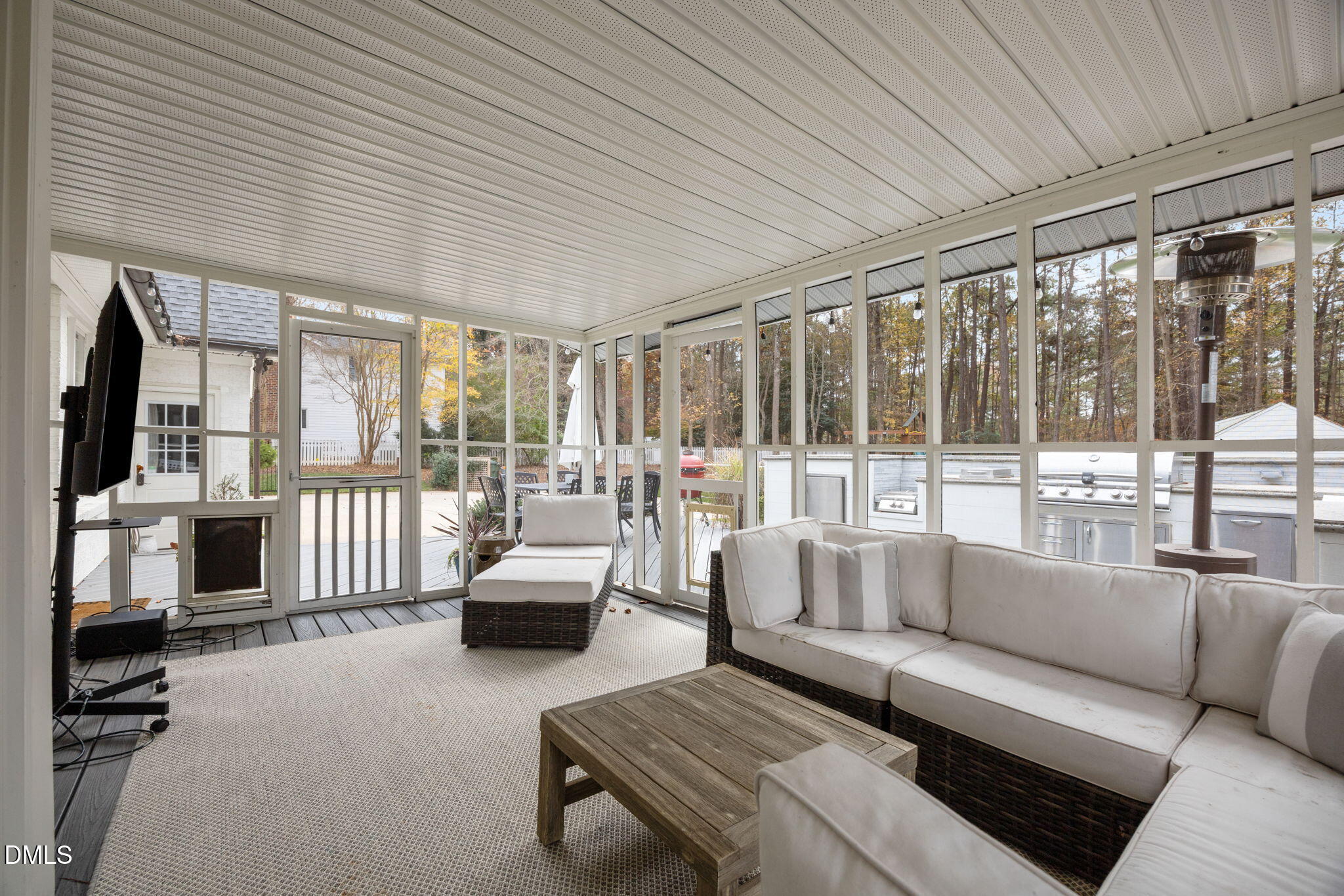 1120 Queensferry Road Cary, NC 27511 - Photo 44 of 62 a living room with furniture and floor to ceiling windows