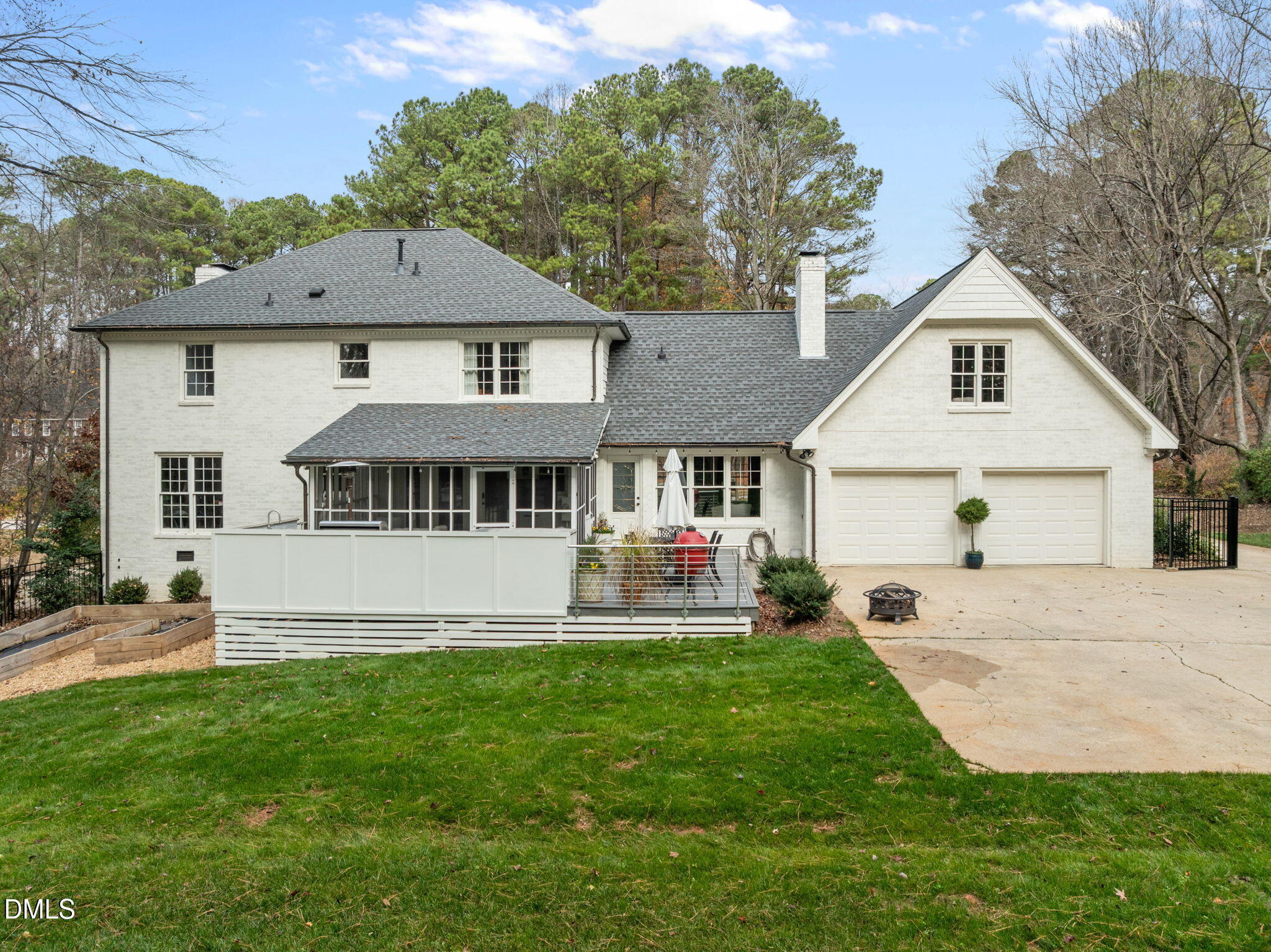 1120 Queensferry Road Cary, NC 27511 - Photo 49 of 62 a front view of a house with a yard and garage