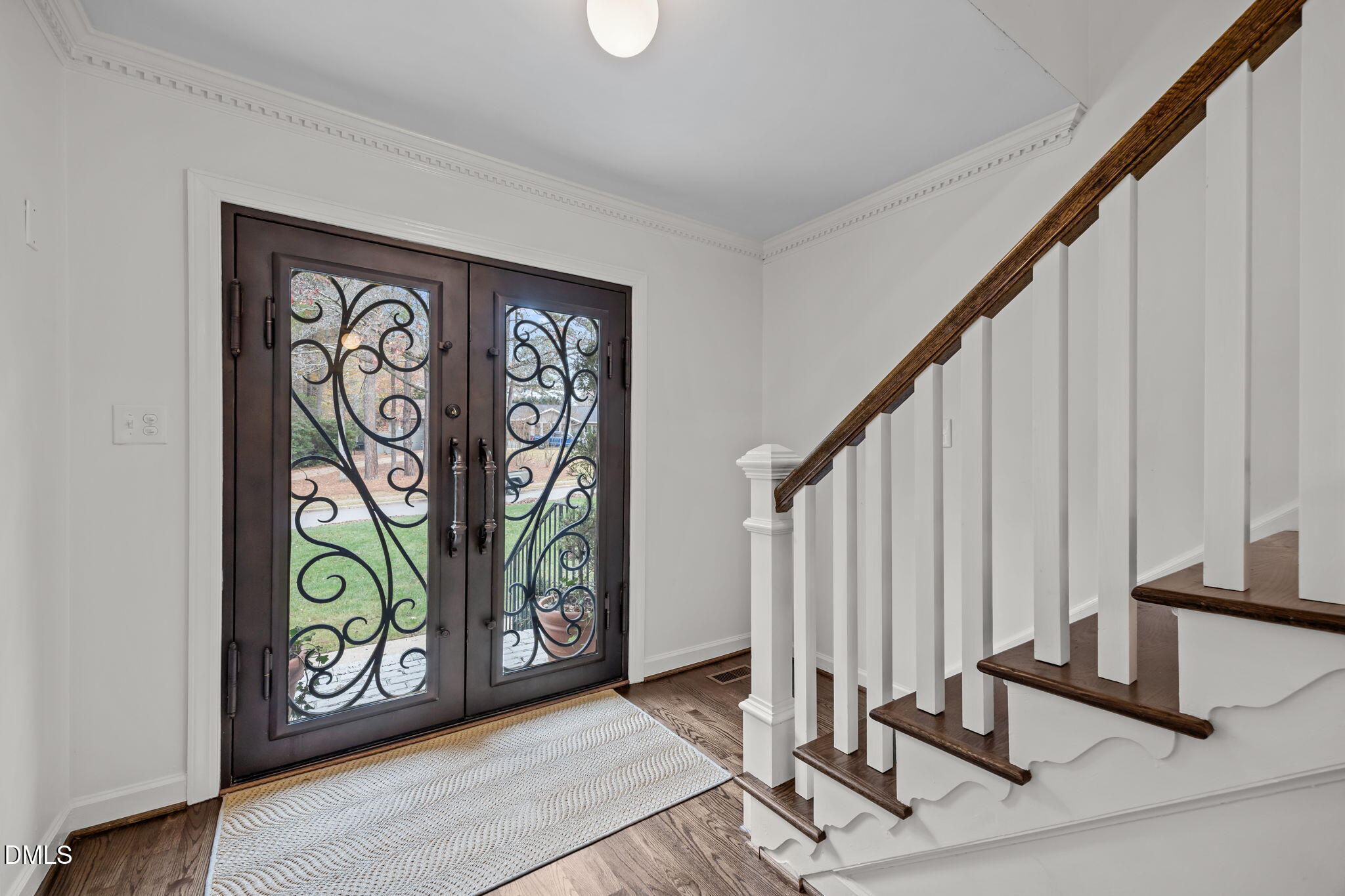 1120 Queensferry Road Cary, NC 27511 - Photo 5 of 62 a view of an entryway with wooden floor
