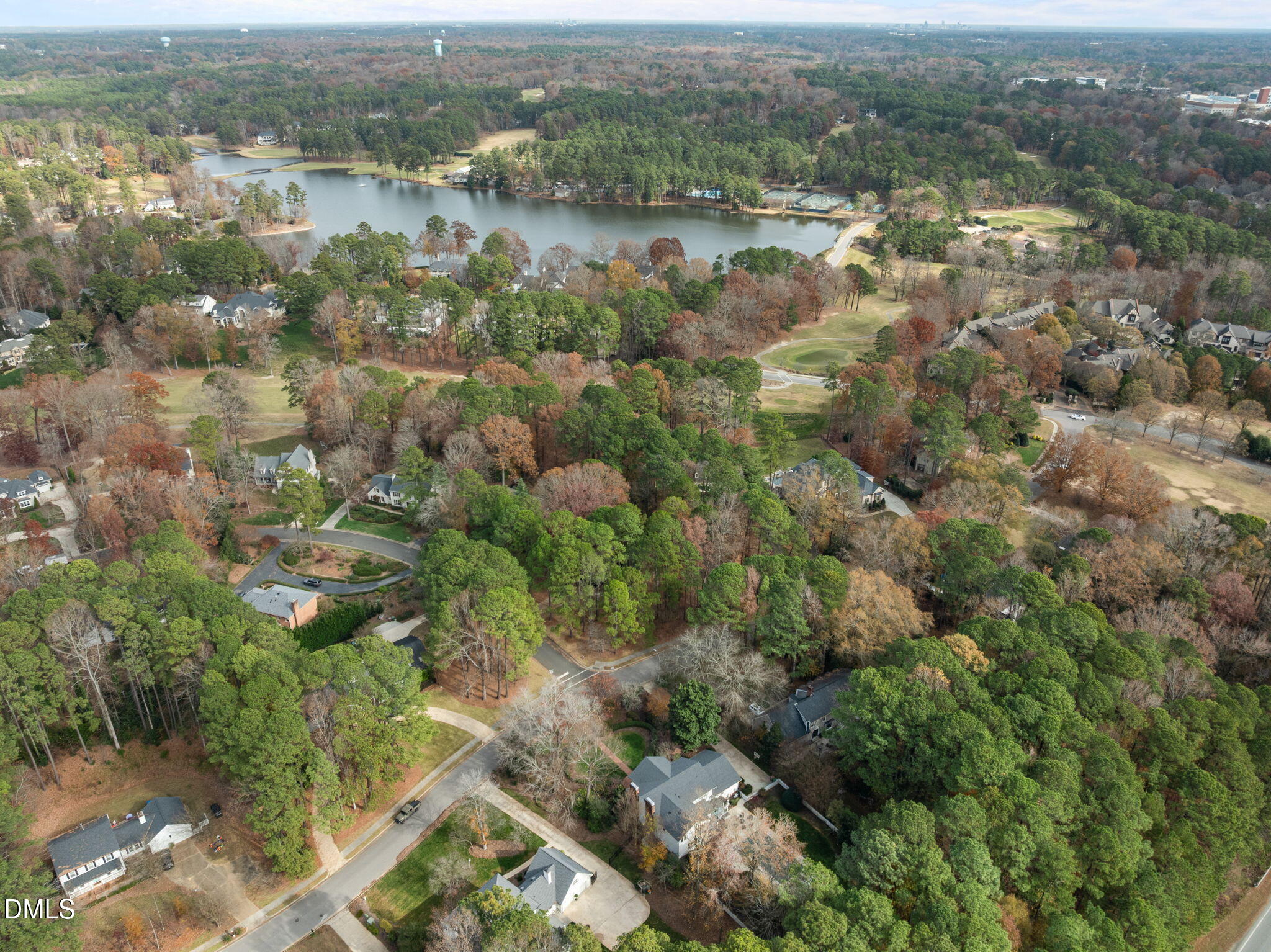 1120 Queensferry Road Cary, NC 27511 - Photo 59 of 62 an aerial view of residential houses with outdoor space and trees