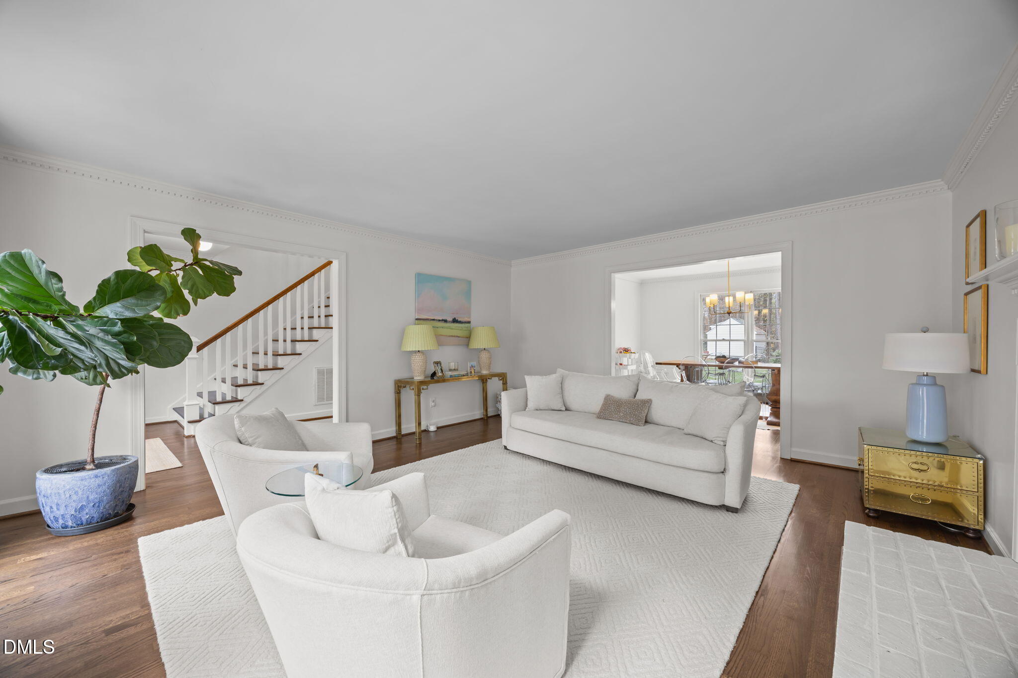 1120 Queensferry Road Cary, NC 27511 - Photo 7 of 62 a living room with furniture and a potted plant