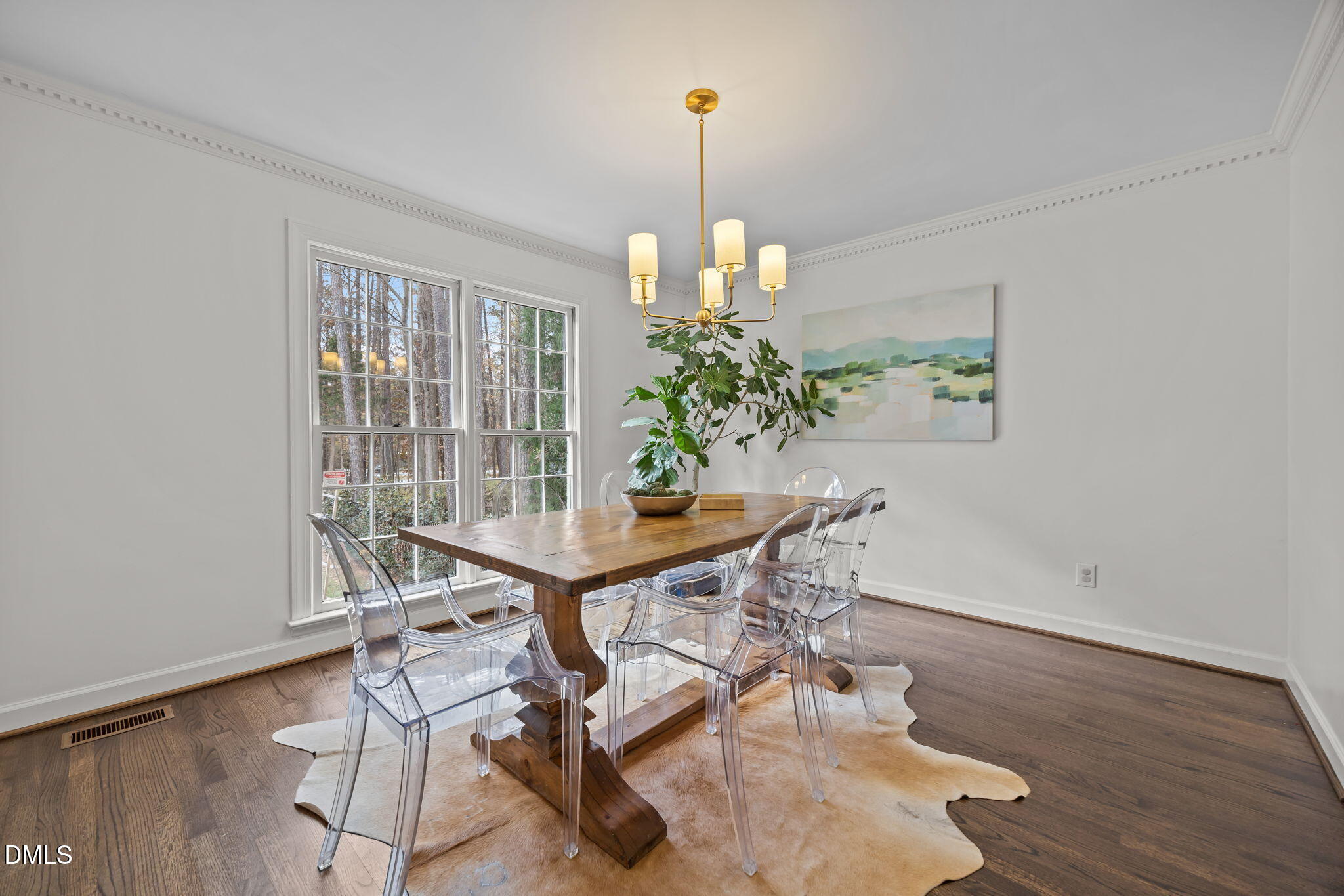 1120 Queensferry Road Cary, NC 27511 - Photo 10 of 62 a view of a dining room with furniture window and wooden floor