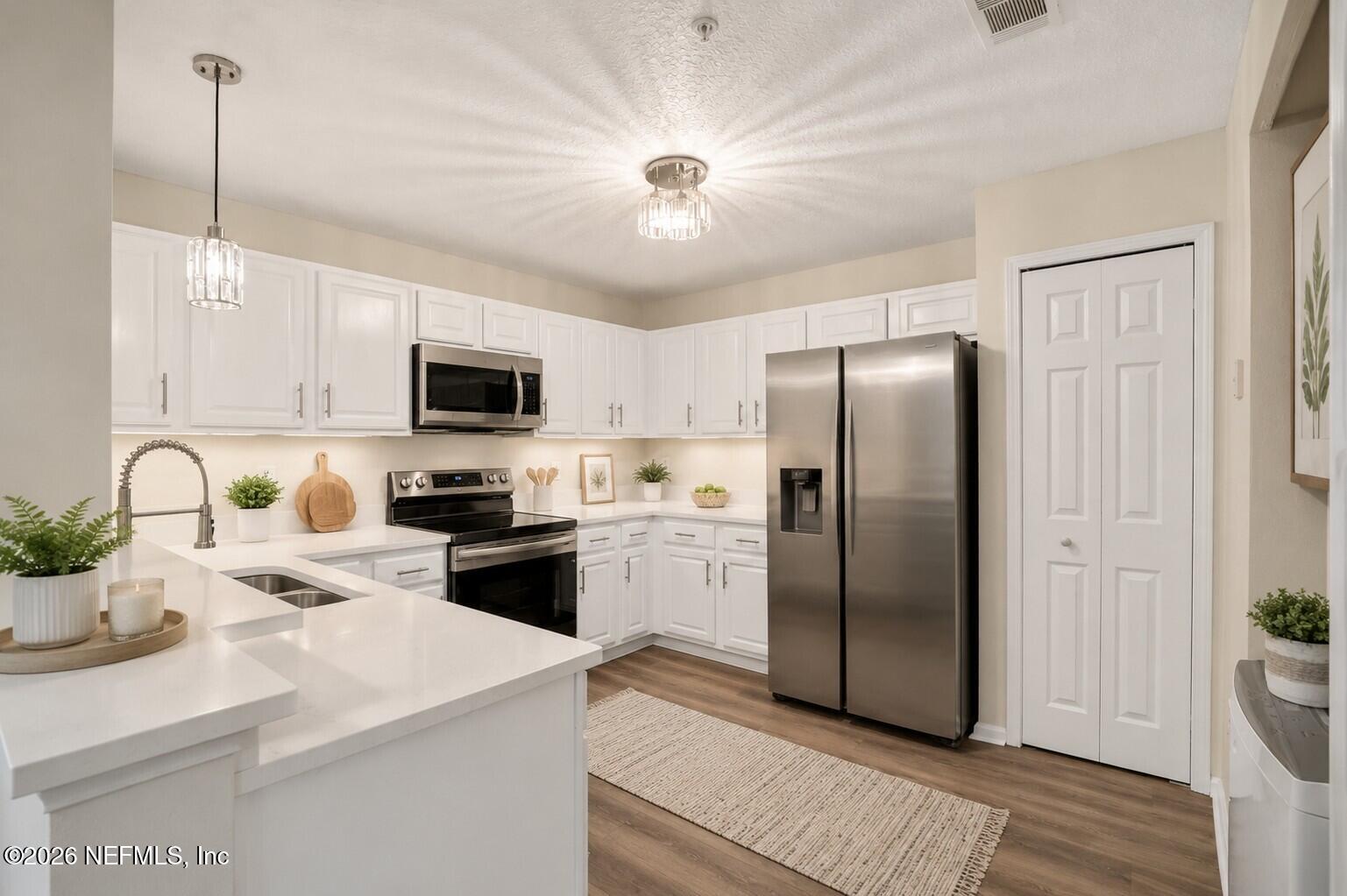 7920 Merrill Road, Unit 615 Jacksonville, FL 32277 - Photo 8 of 26 Virtualy Staged Kitchen