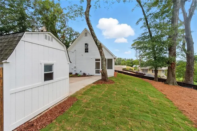 a front view of a house with yard
