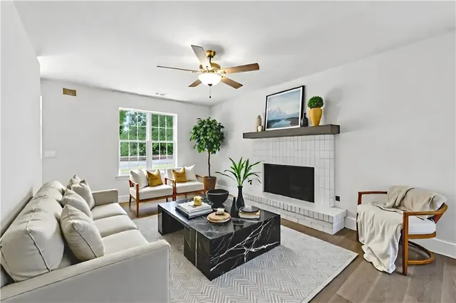 a kitchen with white cabinets sink and appliances
