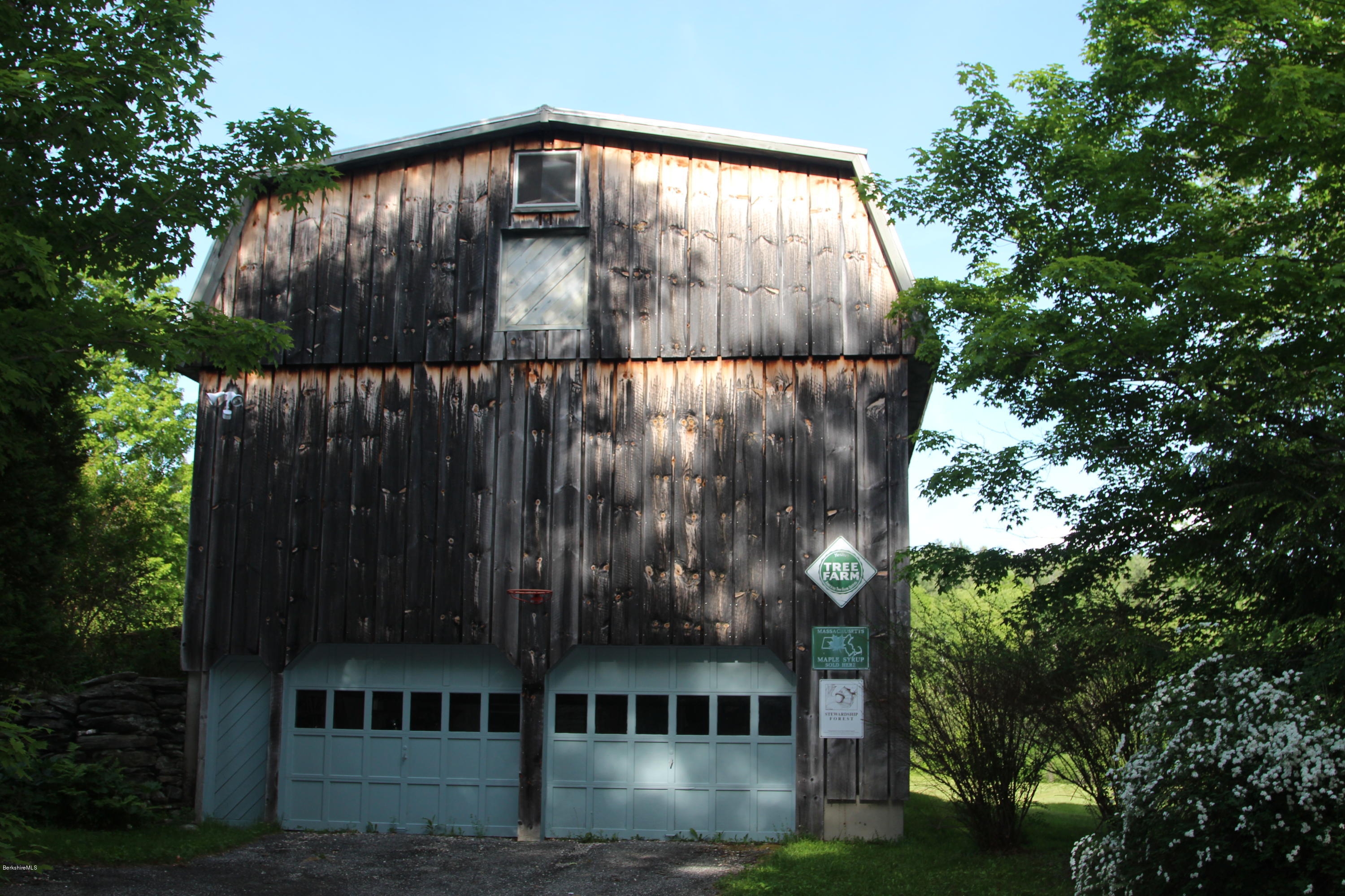 154 Windsor Bush Road Windsor, MA 01026 - Photo 22 of 23 a front view of a house with a yard