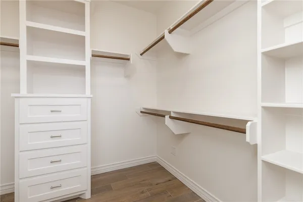 a view of an empty walk in closet