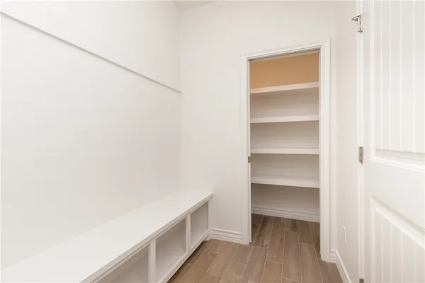 a view of an empty walk in closet