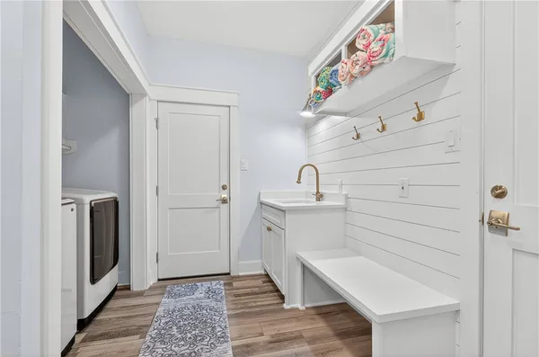 a hallway with storage and utility