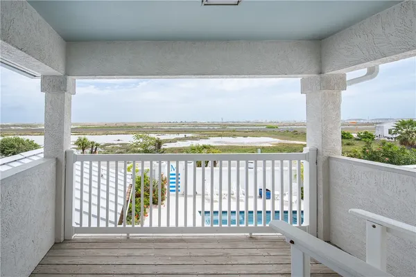 a view of a balcony with an outdoor space
