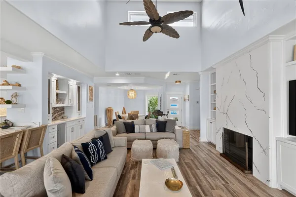 a living room with furniture a fireplace
