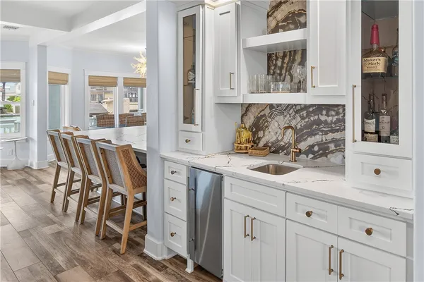 a view of a kitchen with chair and table