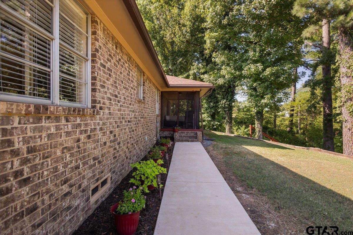 2855 County Road 1310 Rusk, TX 75785 - Photo 6 of 49 Front Sidewalk Leading to Screened in Porch