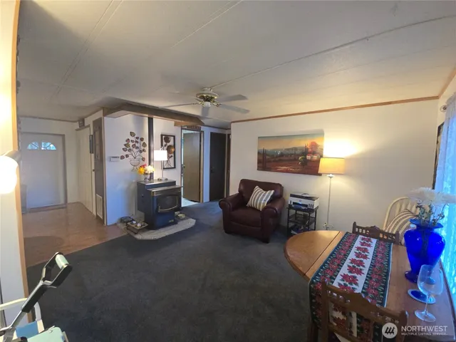 a bedroom with furniture and a window