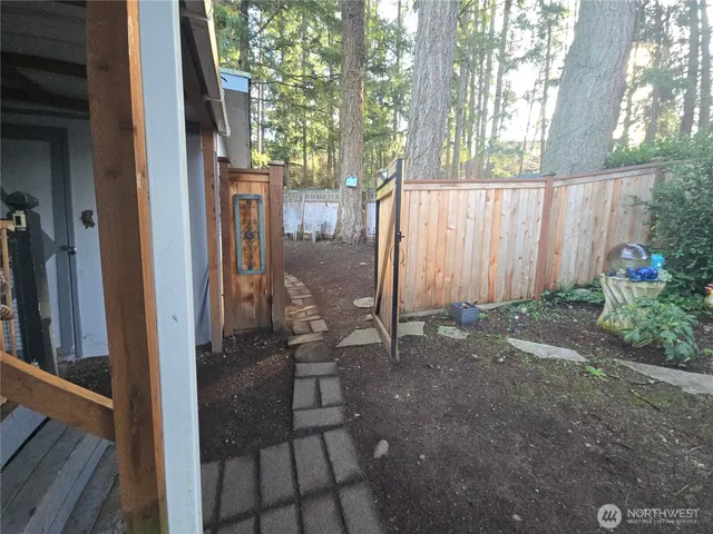 a view of yard from a corridor