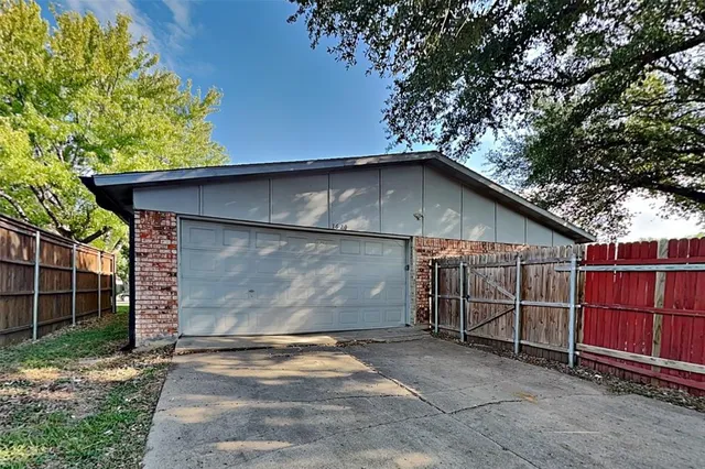 a white toilet sitting next to a bath tub