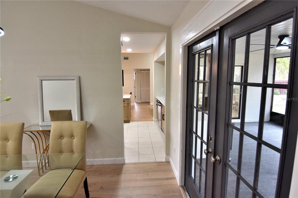 4014 Treetop Circle Spring Hill, FL 34606 - Photo 15 of 31 a view of a hallway with furniture and windows
