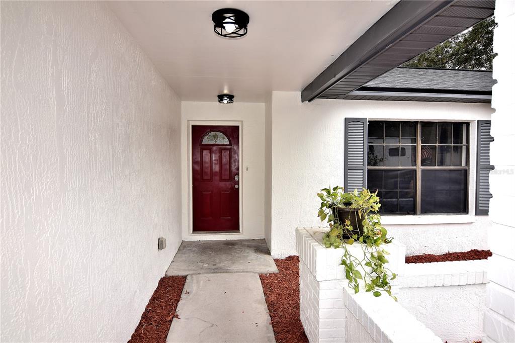 4014 Treetop Circle Spring Hill, FL 34606 - Photo 2 of 31 a front view of a house