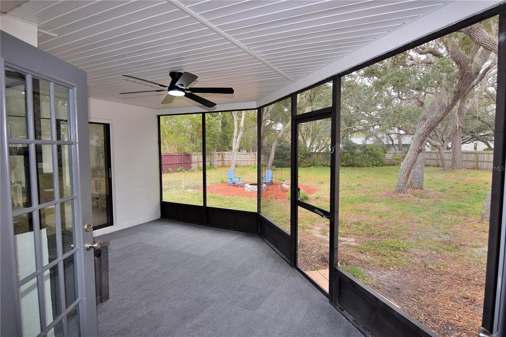 4014 Treetop Circle Spring Hill, FL 34606 - Photo 27 of 31 wooden floor in an empty room with a window