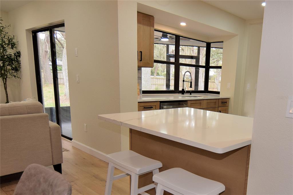4014 Treetop Circle Spring Hill, FL 34606 - Photo 9 of 31 a bathroom with a sink toilet and window