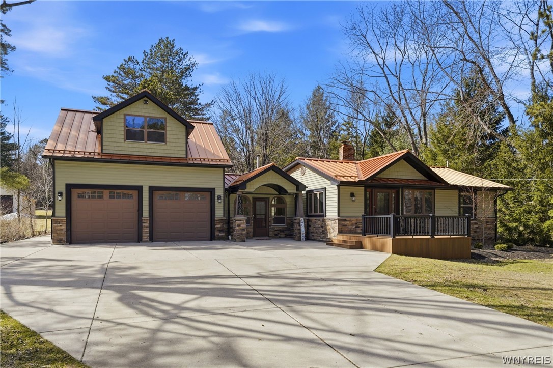 7228 Lower East Hill Road Boston, NY 14033 - Photo 2 of 46 New concrete driveway that extends around the side
